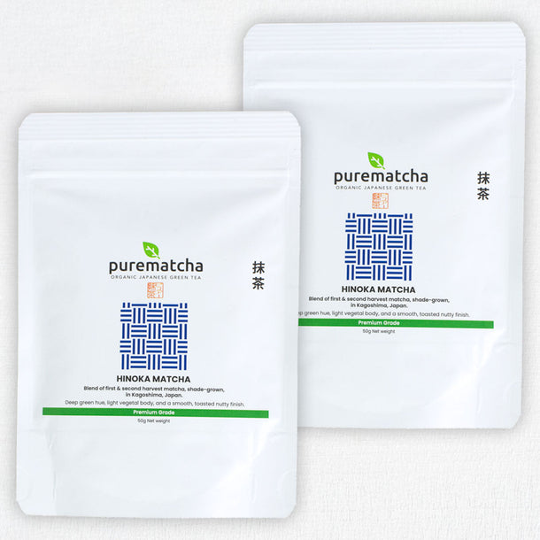 Two HINOKA Matcha green tea packs on a white background