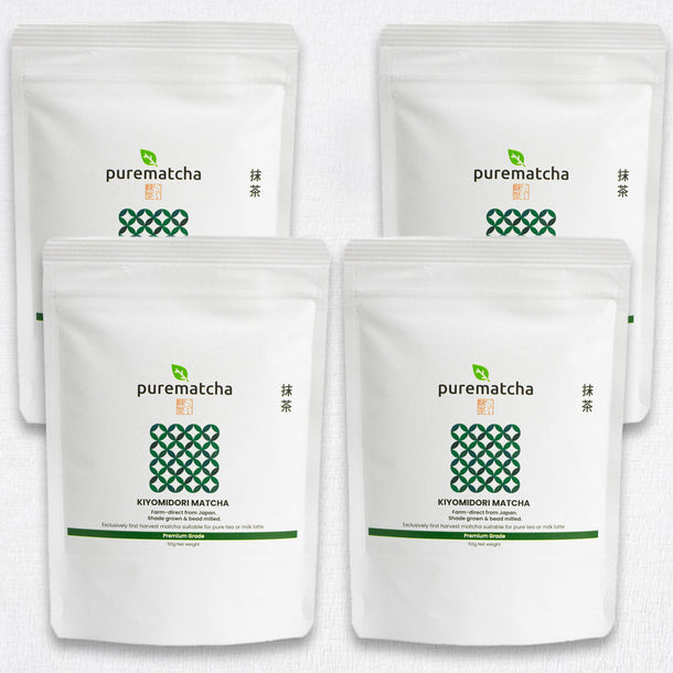 Four white packages of KIYOMIDORI purematcha on a white background