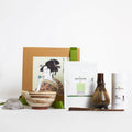 Tea-making set with 'purematcha' branding on a white background