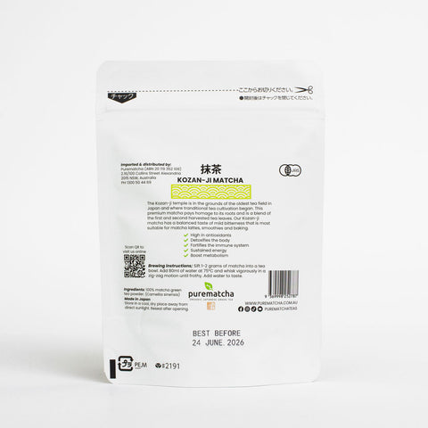 Back of a Kozan-Ji Matcha package with text and branding on a white background