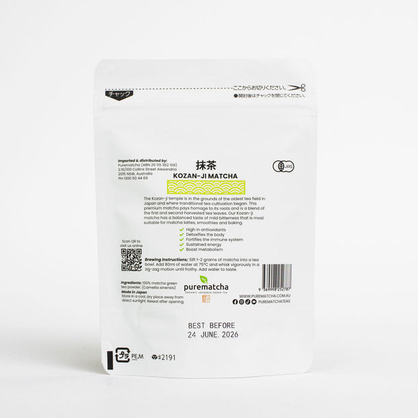 Back of a Kozan-Ji Matcha package with text and branding on a white background